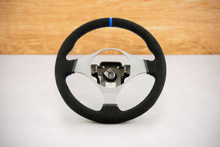 Obszycie kierownicy Mitsubishi Lancer