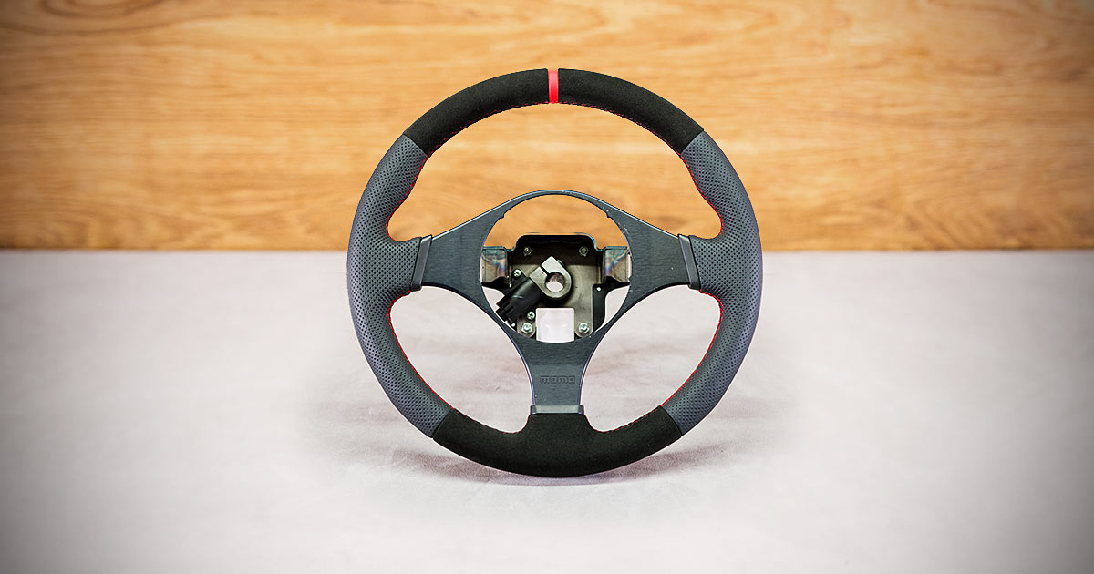 Obszycie kierownicy Mitsubishi Lancer VIII